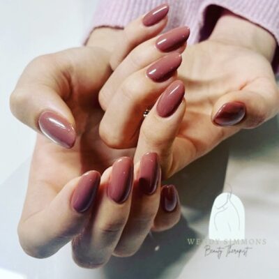 Ladies nails with pinky brown gel polish
